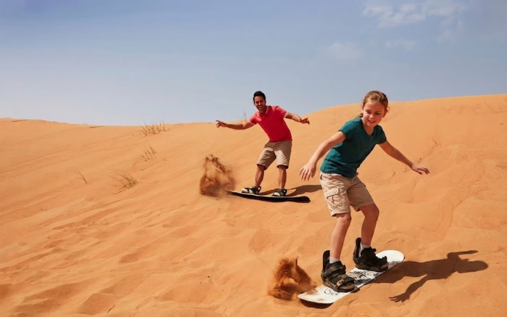 sandboarding-fun-desert-safari-red-sand-dunes